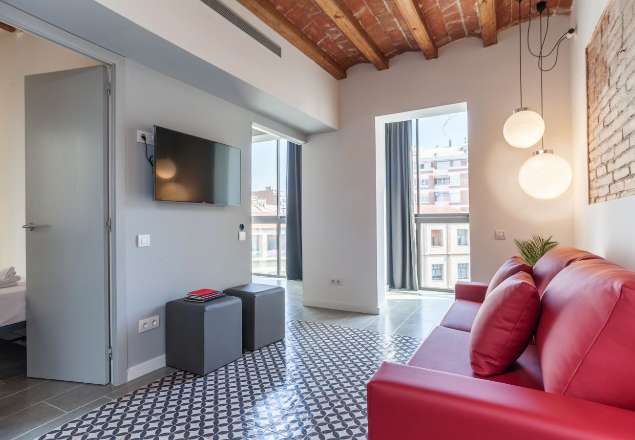 Apartamento de diseño con 3 habitaciones y acceso a la terraza compartida en el centro de Barcelona